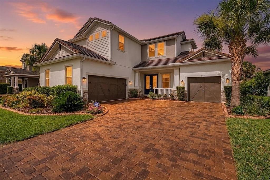 Pavered driveway and 3 car garage