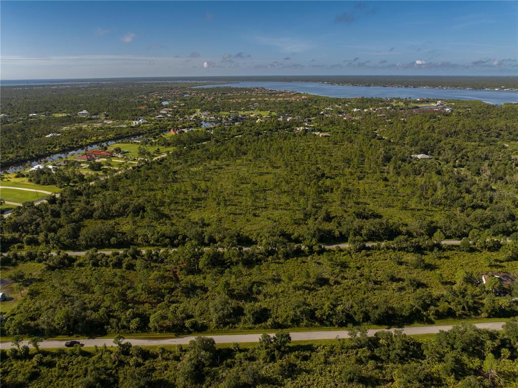 residential lot in Port Charlotte, FL with owner financing and flexible terms. Purchase this buildable lot with $5,400 down, finance the remaining balance over 36 months at 8% interest, and enjoy affordable estimated payments of approximately $408 per month.