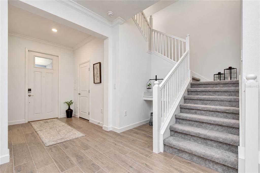 Thoughtfully designed layout offering convenient first-floor living with additional flexible space upstairs.