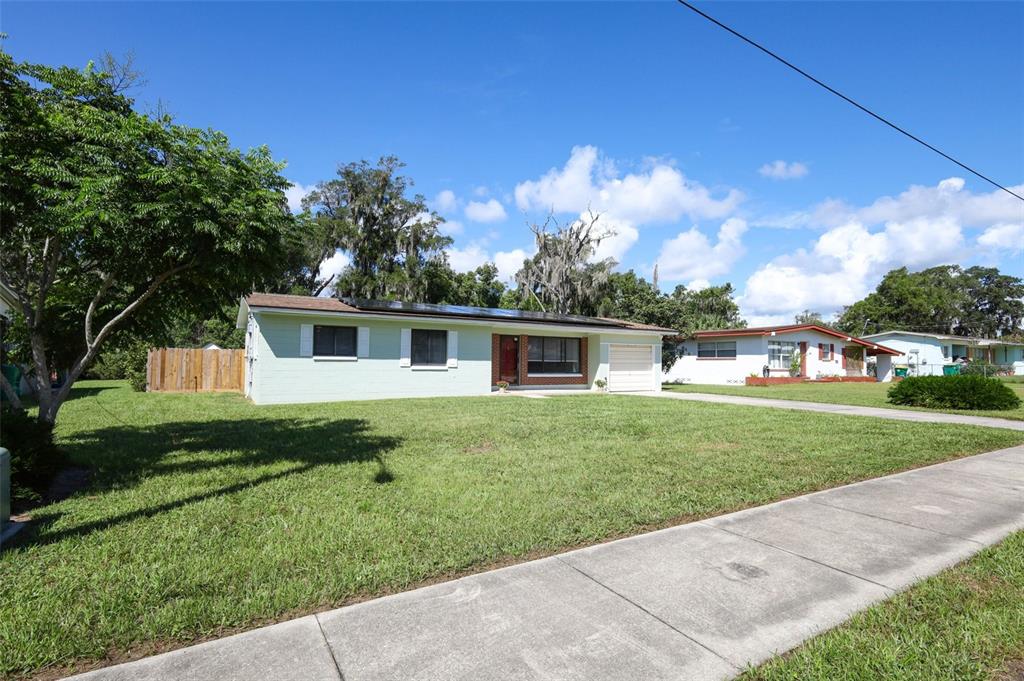 Large Front Yard with Fenced Backyard