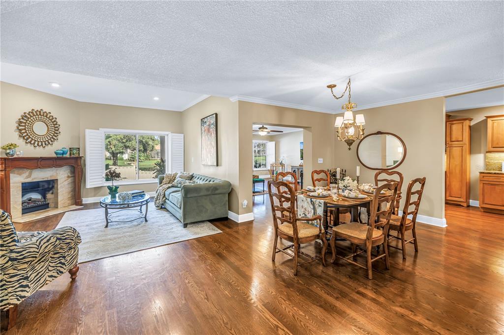 This updated townhome features two expansive, open-concept living areas and genuine oak hardwood flooring throughout, providing an enhanced sense of luxury.