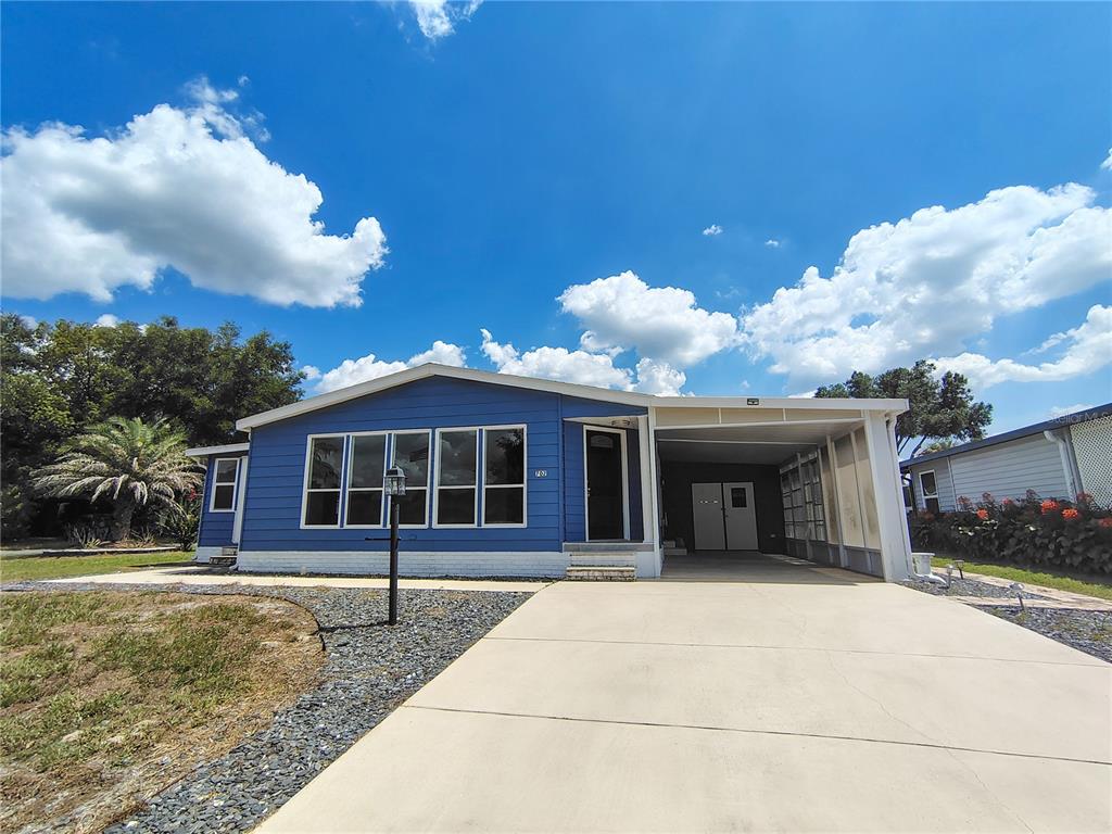 Property for sale at 702 TURNBERRY LANE, LADY LAKE, FL, 32159