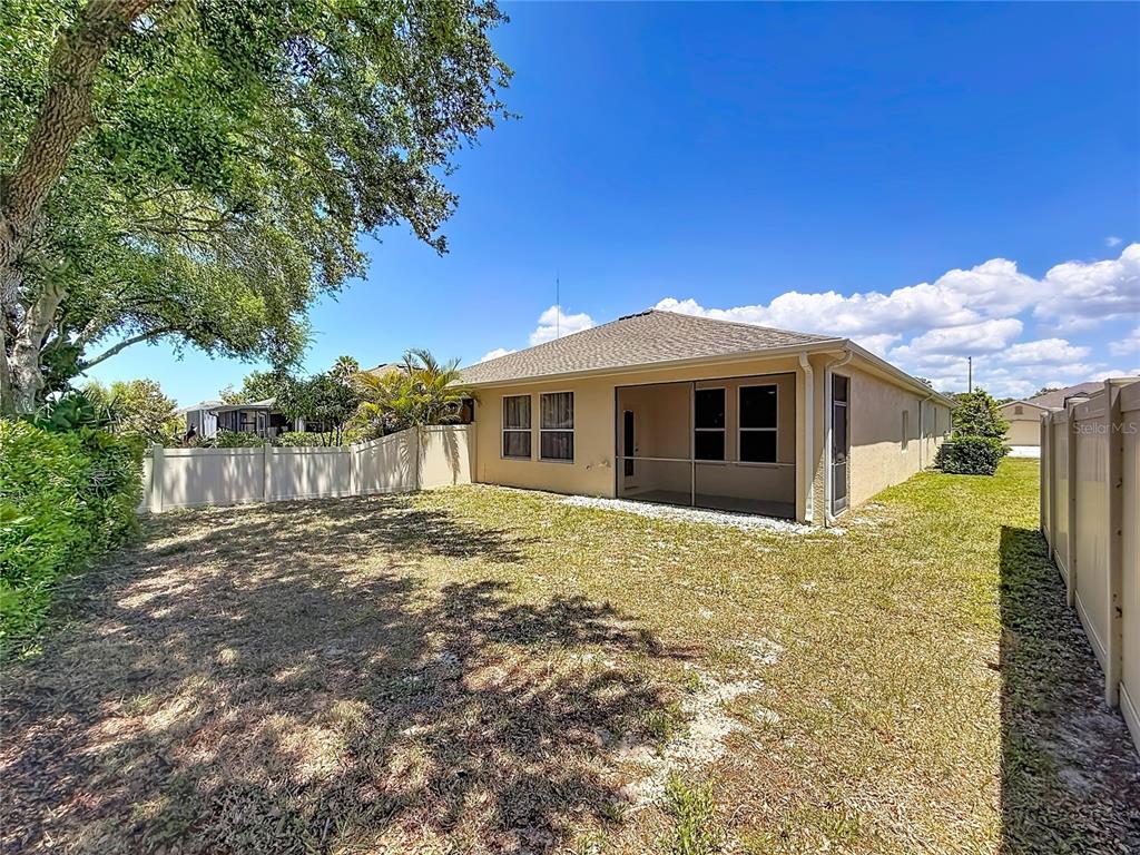 Live the FL Lifestyle; Large flat backyard with screened patio