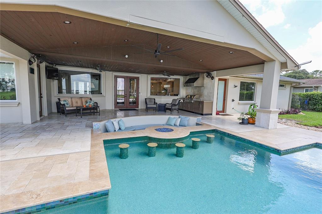 Swim up bar with gas fire-pit