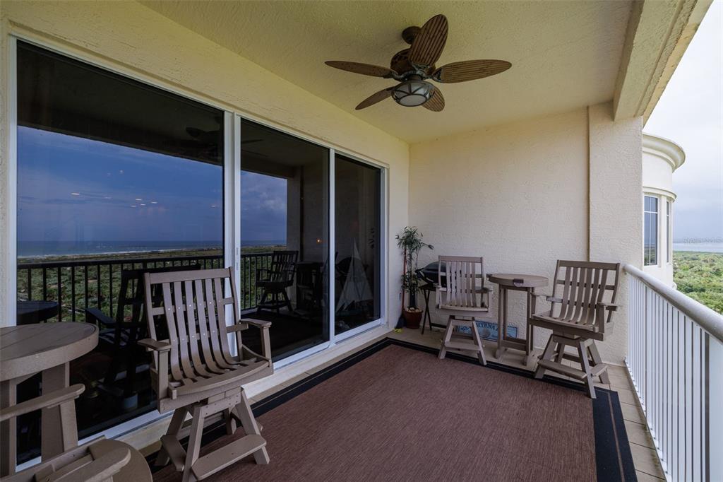 Balcony opens to the ocean, river & boating action.