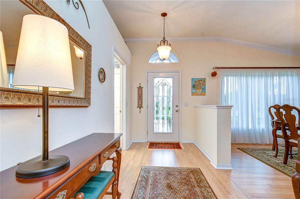 Welcoming entry opens to bright and inviting living spaces filled with natural light.
