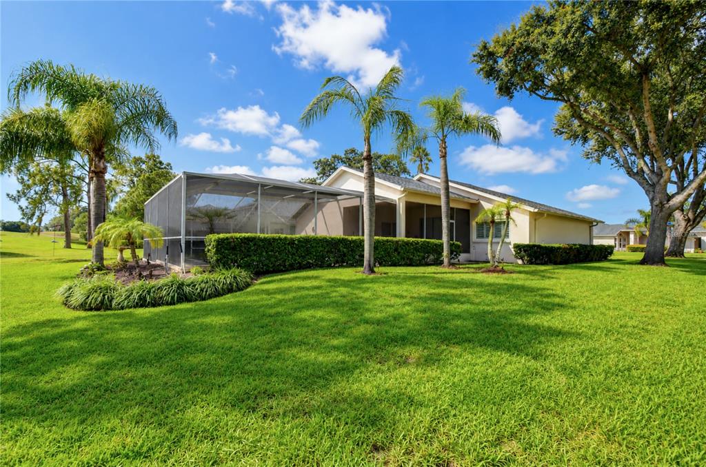Private outdoor space combines poolside relaxation with scenic 6th fairway views.