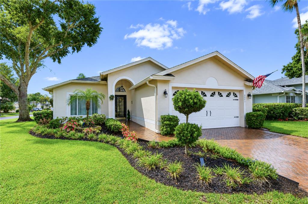 Beautiful brick paver driveway creates an elegant approach to the home.