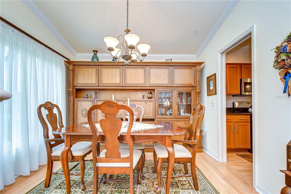 Elegant dining space filled with natural light, perfect for holiday gatherings and dinner parties.
