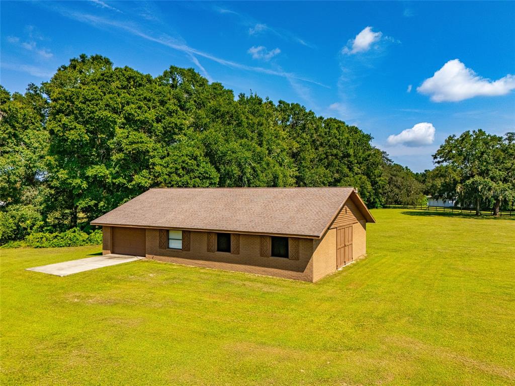 4 Stall Block Barn with a workshop that could be made into an apt. very easily. A/C & Bathroom already there.