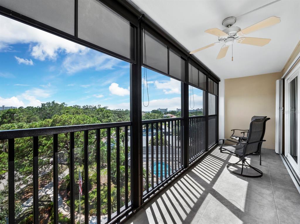 Tile flooring on the lanai, shade screens and easy slide permanent storm shutters in addition to the imact glass sliders for added protection.