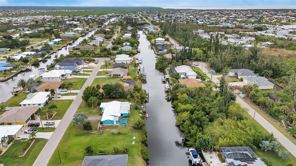 3 lots on right side of the canal with access to open water.