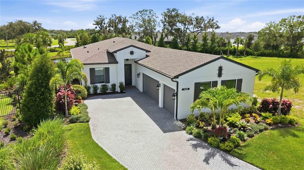 Upgraded, 3-Car Laura in Gated Woodland Preserve