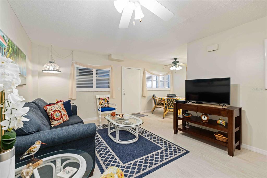 Turnkey furnished condo with pull out sofa in living room