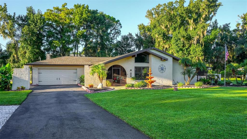 Welcome to 8106 Spring Drive~CANAL FRONT HOME!