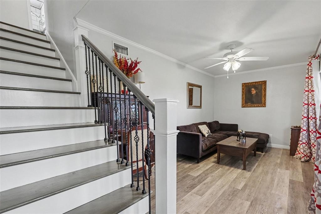 Upon enrtry the living room is on the right and private. Use as a living room, reading room, home office, or relaxing room.