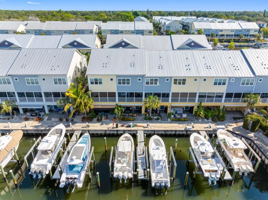 Rear view with wet slips and dock