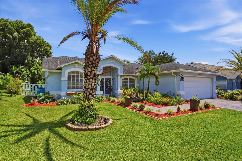Exterior Front..fabulous landscaping!!