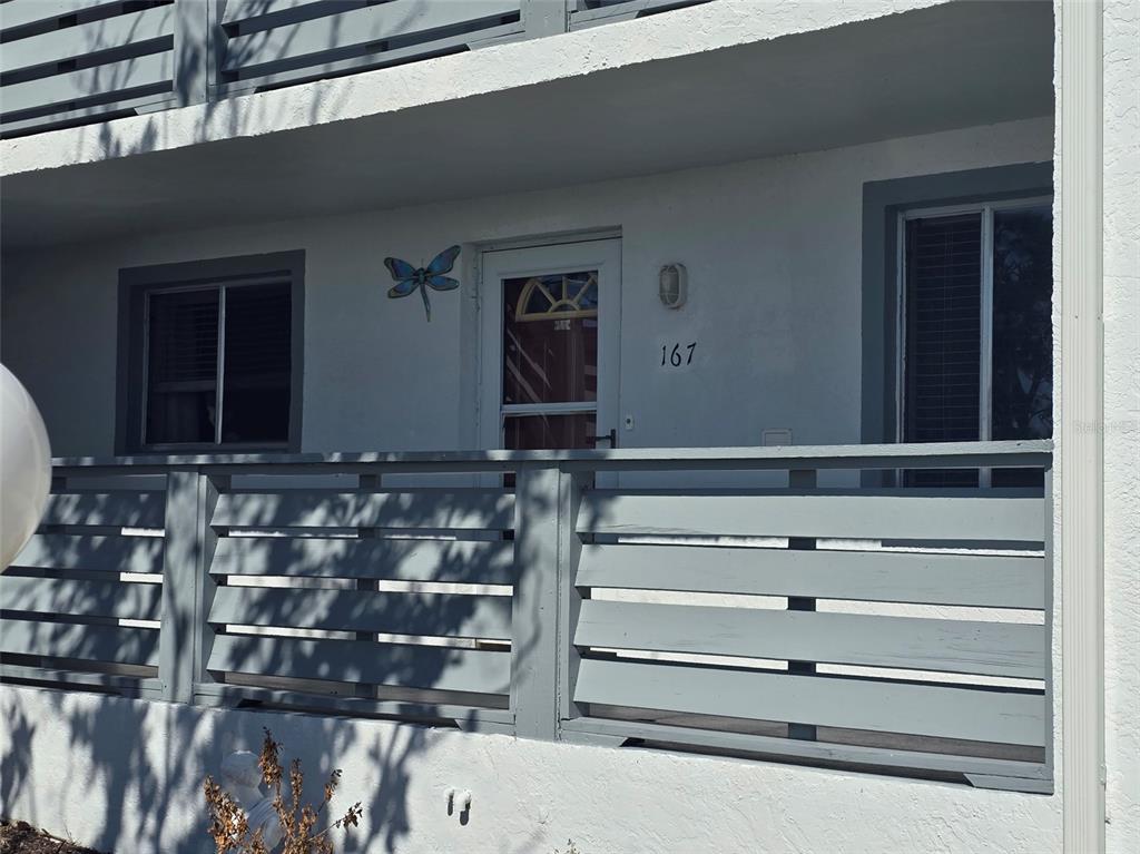 Front door with shaded porch