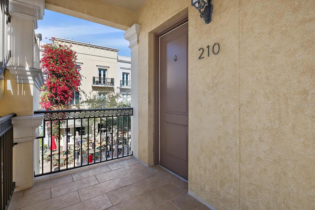 Exterior corridor leading to residence