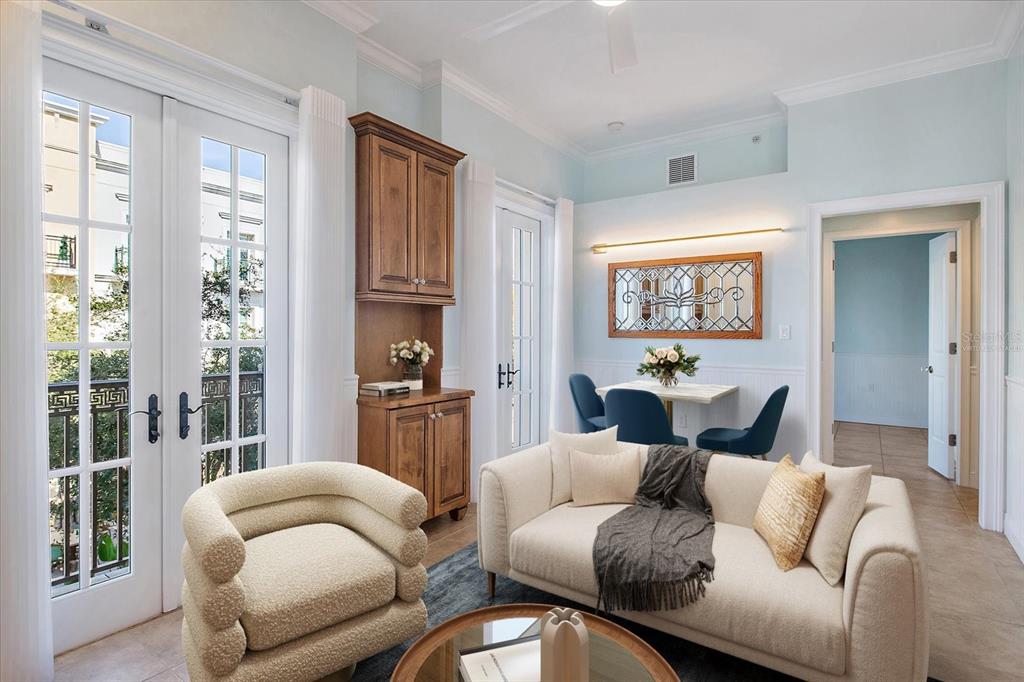 Virtually staged -Living room with natural light and courtyard views