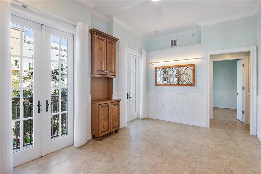 Living room featuring tile flooring and neutral finishes