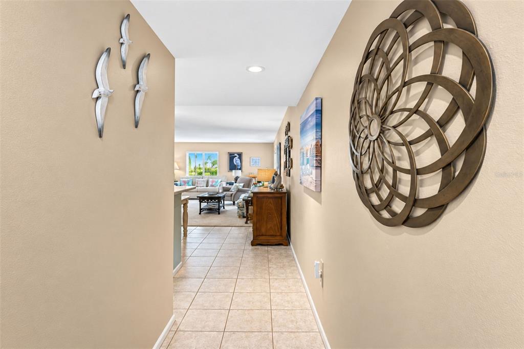 The tiled flooring carries into the kitchen & dining area from the front entry.