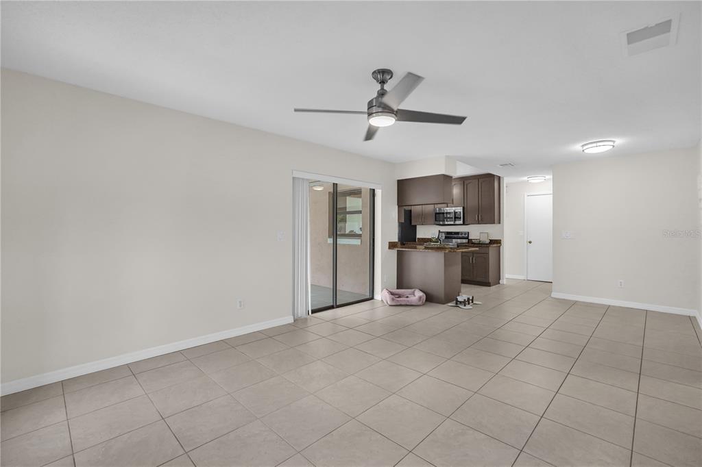 Family room looking at kitchen and breakfast space