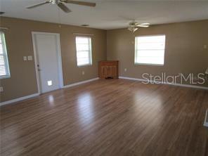 Great room with door to screened porch