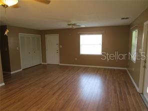 Entry to Living Room with laundry closet on left