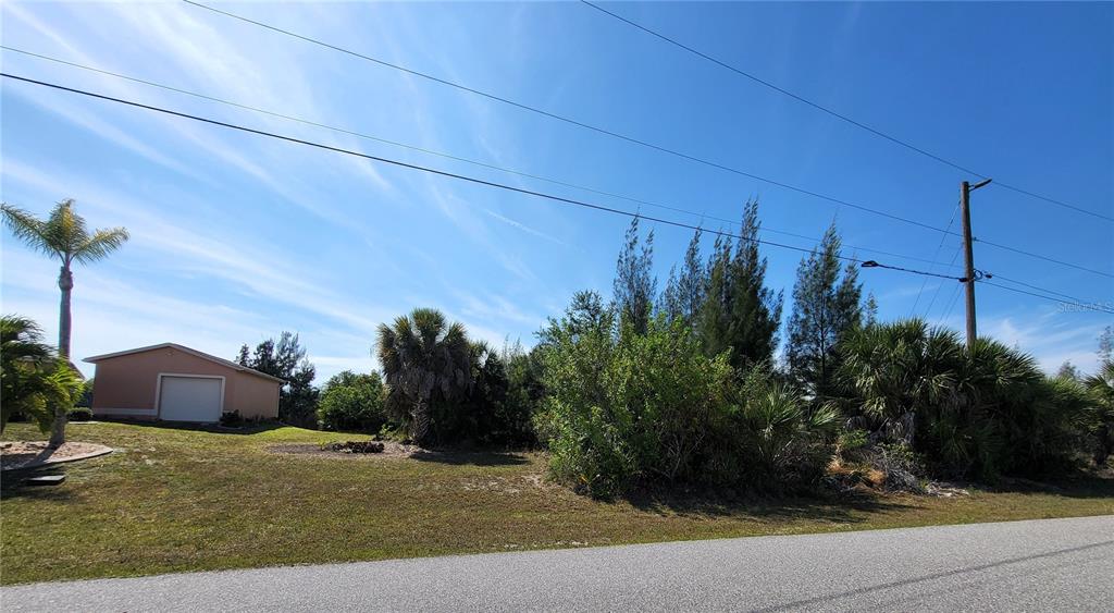 Power pole is on the approximate property line. Building is on neighbors property.