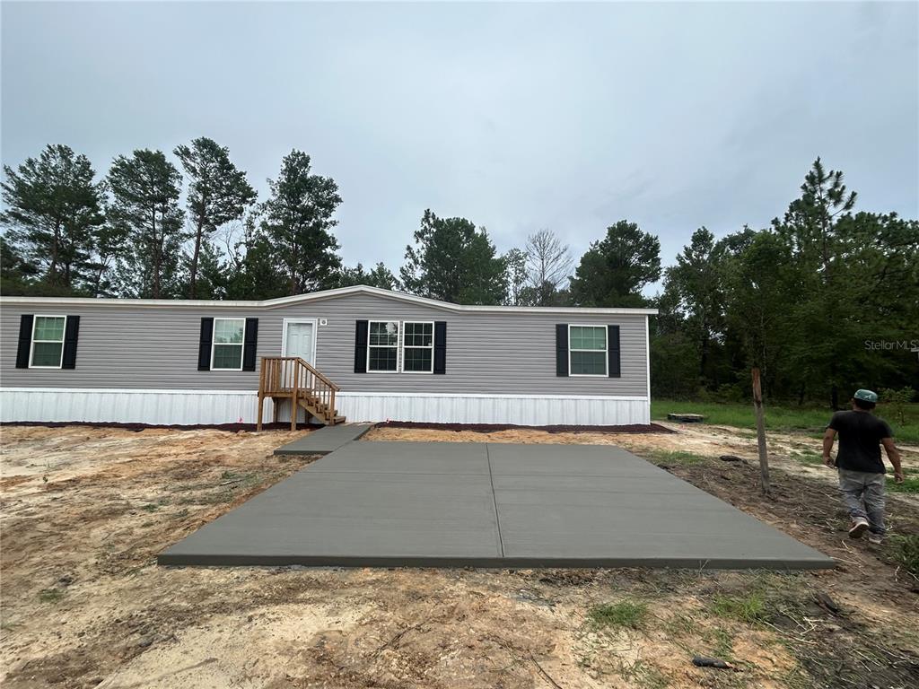 Parking pad & Sidewalk