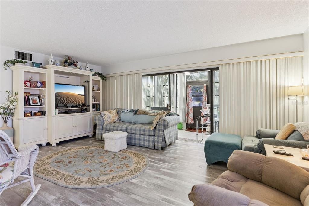 Spacious Living Room with Luxury Vinyl Plank Flooring