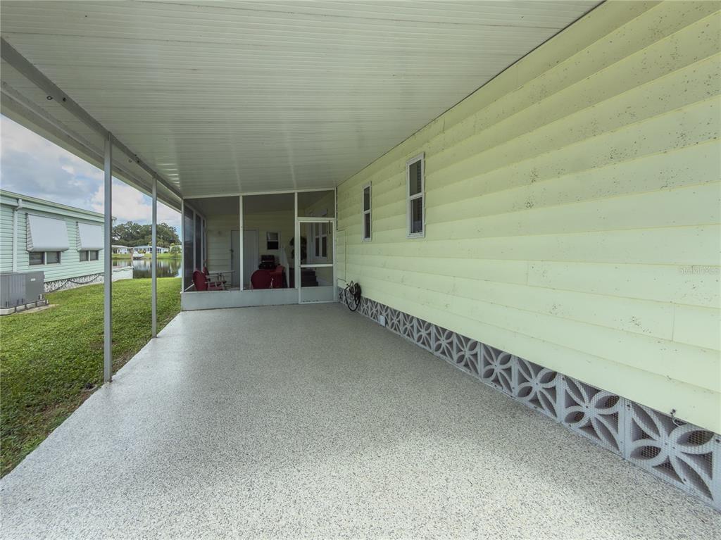 Carport with Screened in Patio