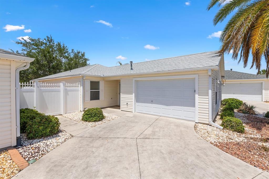 WELCOME HOME. GARAGE AND FRONT DOOR ENTRY