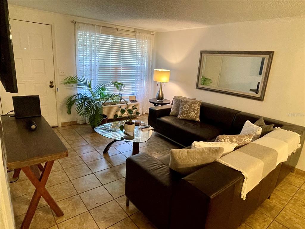 Furniture shown in this photo has been removed. Property is currently vacant and unfurnished.