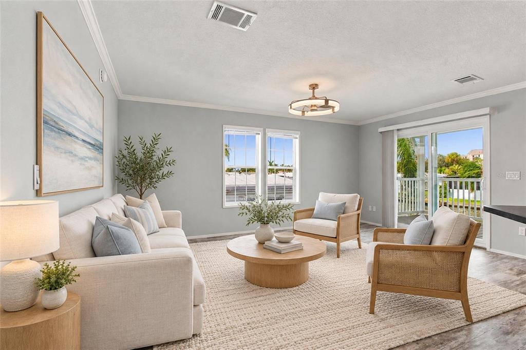 Open Living Room wth Sliders to back patio and water access