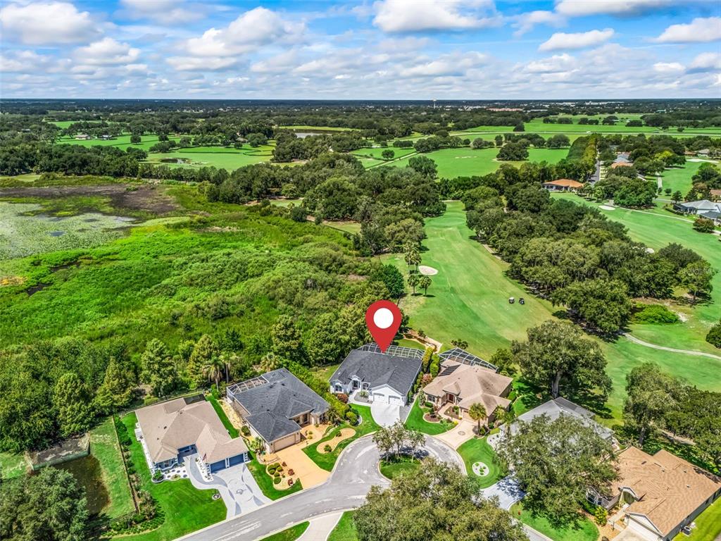 Premier Home w/ Beautiful Surroundings!Aerial perspective highlights the home's desirable location surrounded by lush green space with TIERRA DEL SOL CHAMPIONSHIP GOLF COURSE VIEWS & privacy along the HUDSON MORSE PARR WILDLIFE PRESERVE!