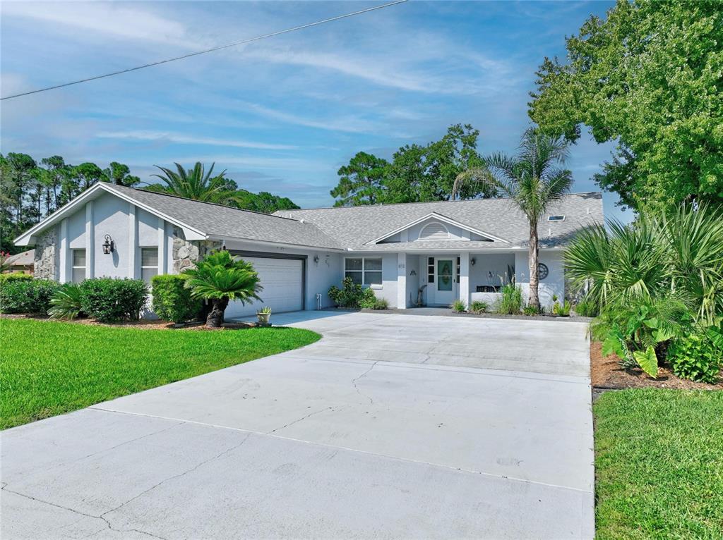 Exterior Front With Oversized Garage