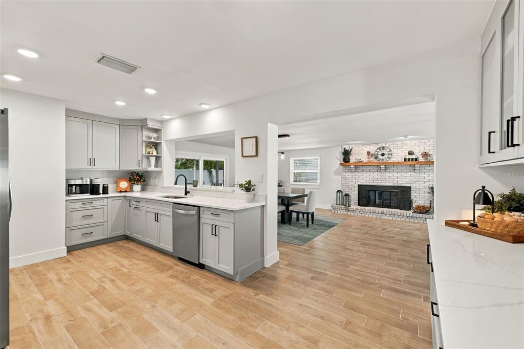 Kitchen w/ View of Family + Dining Room ,