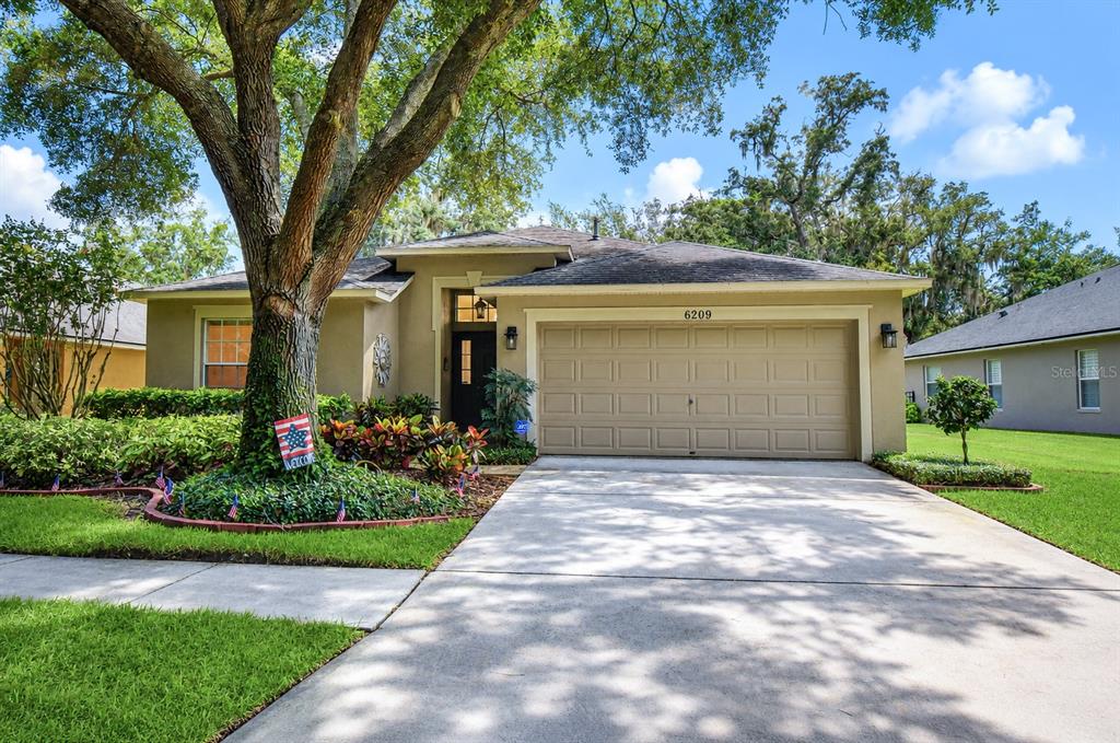 Beautifully maintained home in sought-after FishHawk Ranch.