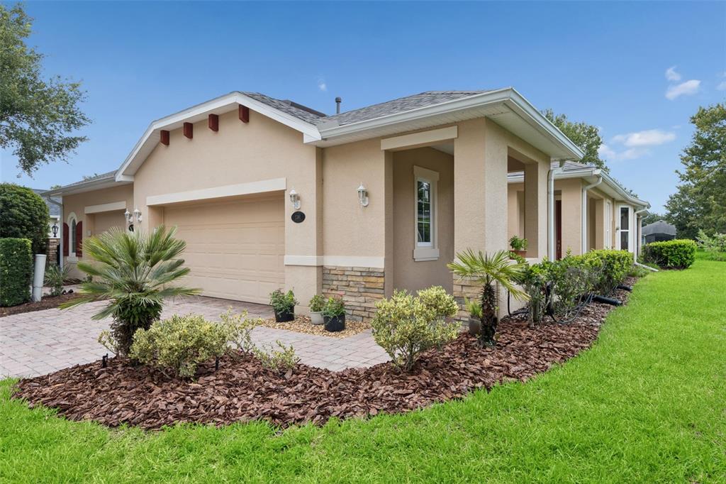 Exterior front of the Villa w/ an oversized 2-car garage
