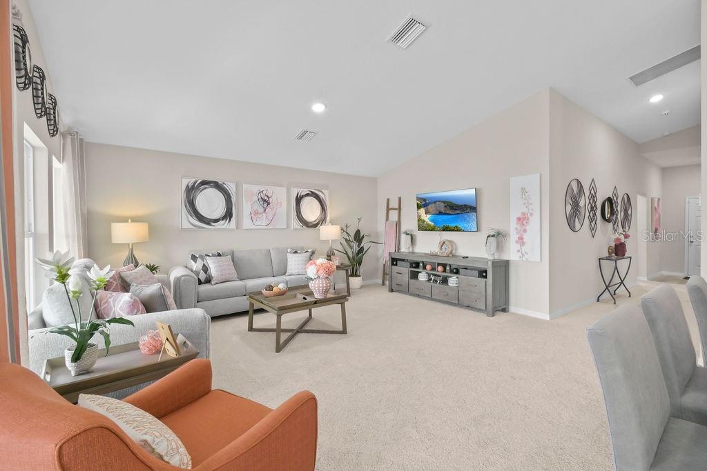 Open floor plan with lots of natural light.Photos are from previous listing. Home was staged
