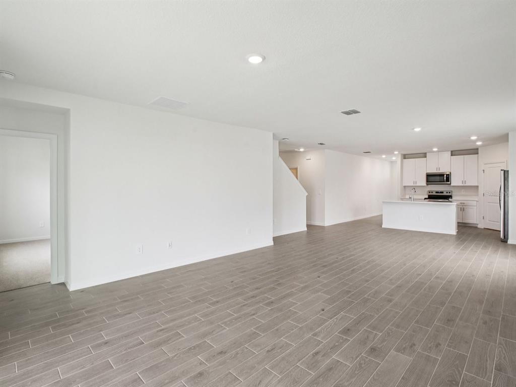 Interior photos are not of the actual home but are photos of the builder home with the same floorplan with similar interior finishes and features.