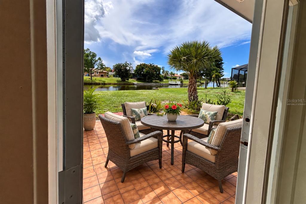 Virtually staged with patio furniture.