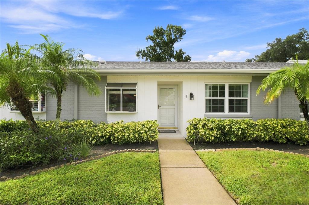 Beautifully landscaped front entry~
