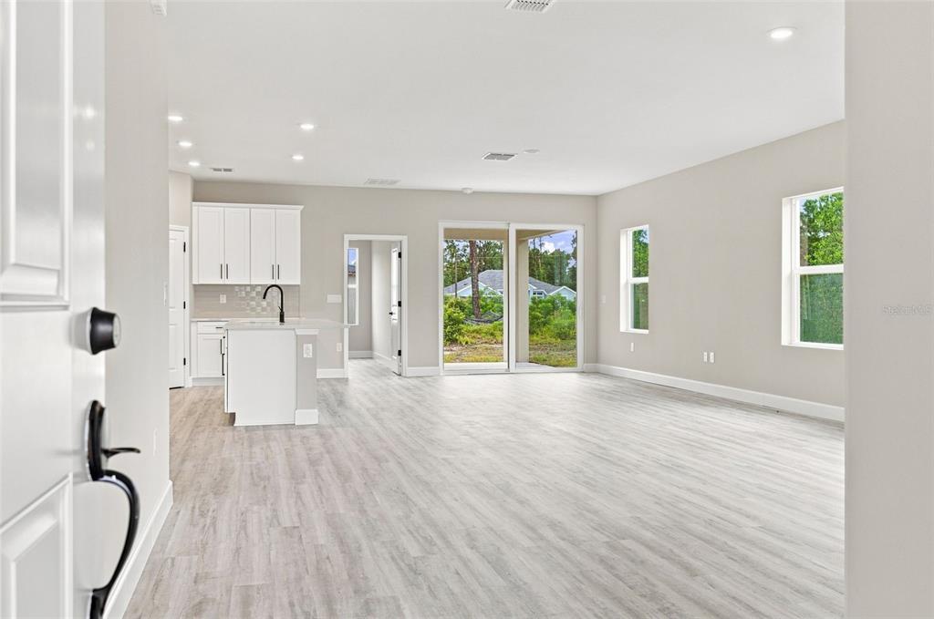 Light and bright interior with open floor plan and plenty of natural light.