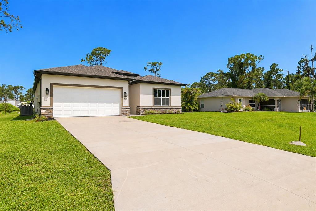 Long driveway and 2-car garage offers plenty of parking.