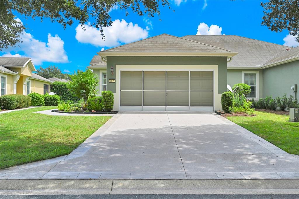 Epoxied Driveway, Walkway & Insulated Garage Door with Screen
