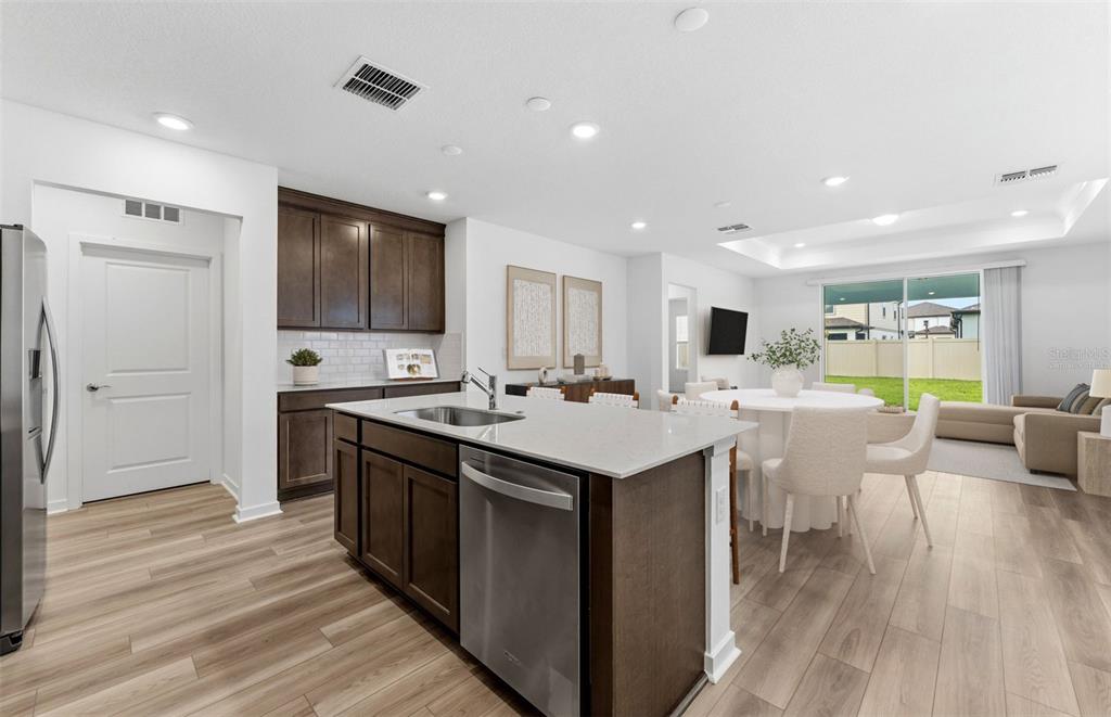 Virtually Staged - Open Kitchen to Cafe to Gathering Room